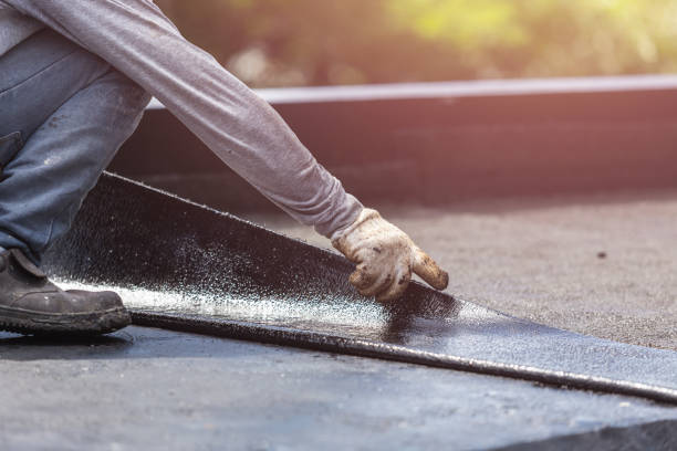 Professional Basement Waterproofing technician working in Roundhead, OH